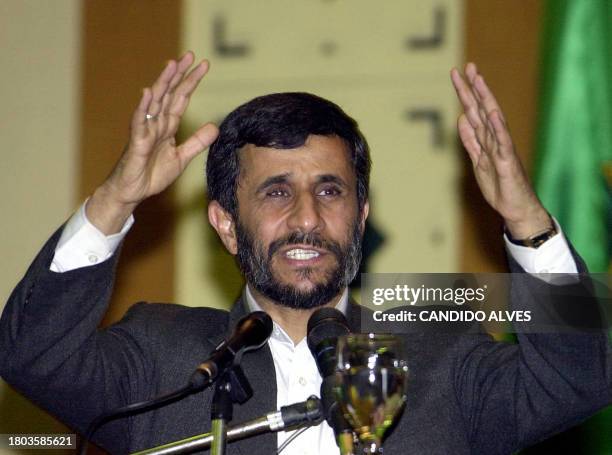 Iranian President Mahmoud Ahmadinejad gestures as he delivers his speech at the Islam University of Syarif Hidayatullah in Tangerang 11 May 2006....