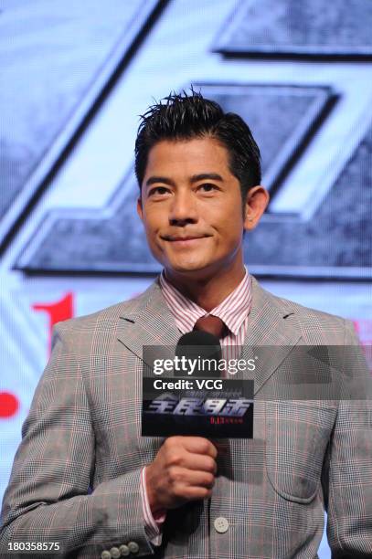 Actor Aaron Kwok attends "Silent Witness" press conference at Millennium Hotel on September 11, 2013 in Beijing, China.