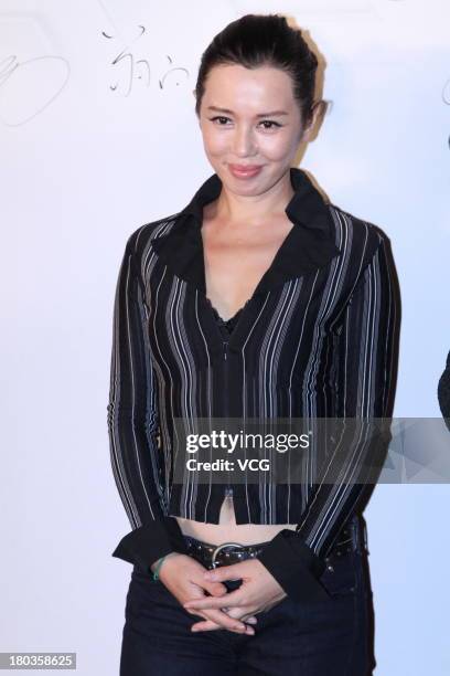 Actress Yu Nan attends "Silent Witness" premiere at Palace Cinema on September 11, 2013 in Beijing, China.