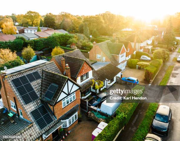 houses on a suburban street - surrey stock pictures, royalty-free photos & images