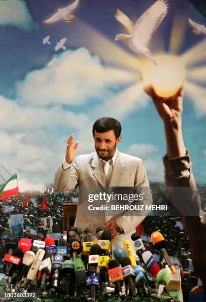 Iranian President Mahmud Ahmadinejad gestures to journalists during a press conference in Tehran 24 April 2006. Ahmadinejad dismissed a UN Security...