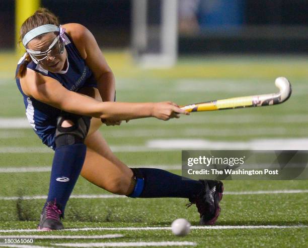 Katie Cummings sends the ball down field as the South County Stallions defeat the Oakton Cougars 2 - 1 in girls field hockey at Oakton High School in...