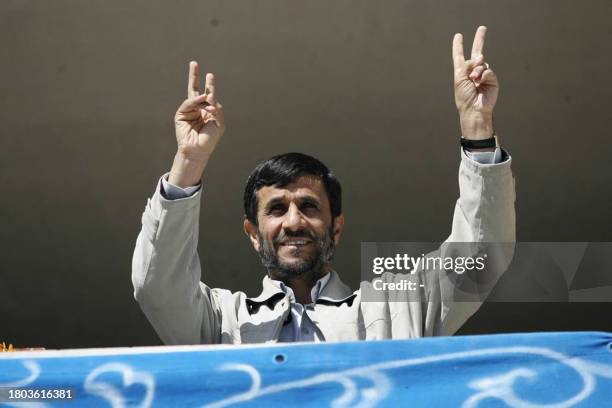 Iranian President Mahmoud Ahmadinejad flashes the V-sign for victory after deliving a speech in Sarakhs near the holy city of Mashhad, 950 kms...