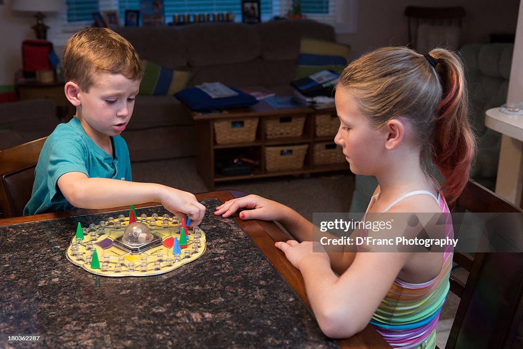 Brother and sister playing a game
