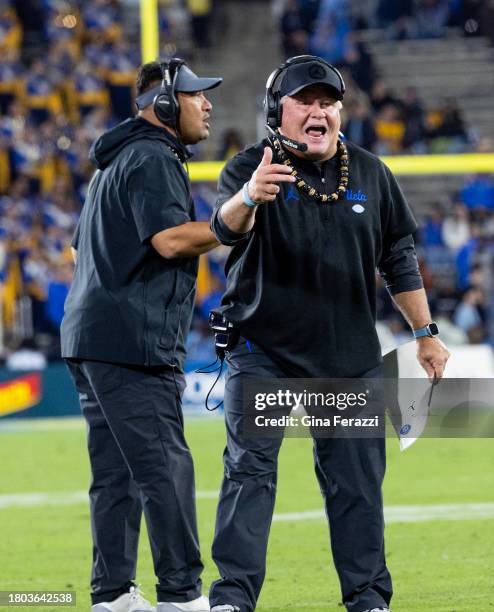 Bruins head coach Chip Kelly yells at the officials after his team was called for a defensive penalty against California in the first half at the...