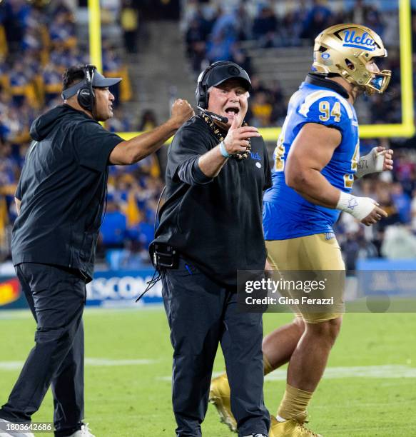 Bruins head coach Chip Kelly yells at the officials after his team was called for a defensive penalty against California in the first half at the...