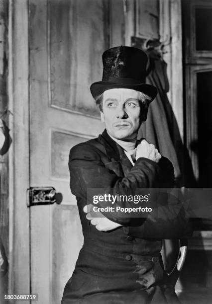 English actor John Gielgud plays the role of Rodion Raskolnikov in a stage production of the novel Crime and Punishment by Fyodor Dostoevsky at the...
