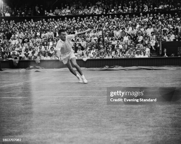 Swedish tennis player Sven Davidson competing to reach the quarter finals of the men's singles at the Wimbledon Tennis Championships in London, July...