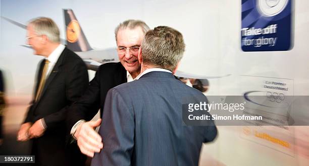 New IOC President Thomas Bach and Jacques Rogge arrive at Frankfurt Airport on September 12, 2013 in Frankfurt am Main, Germany.