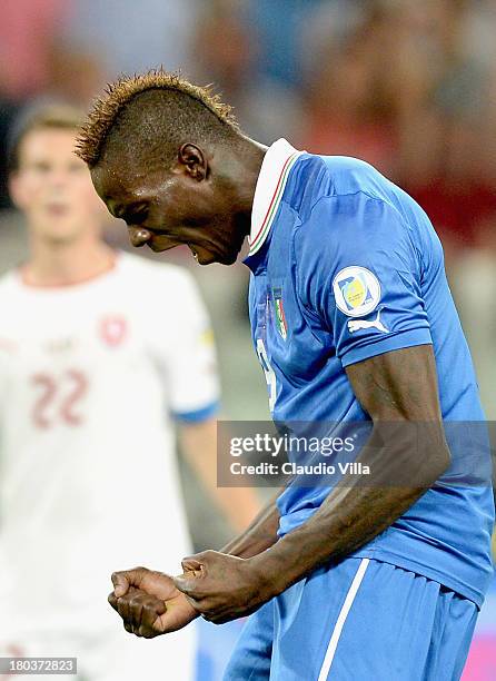 Mario Balotelli of Italy celebrates scoring the second goal during the FIFA 2014 World Cup Qualifier group B match between Italy and Bulgaria at...