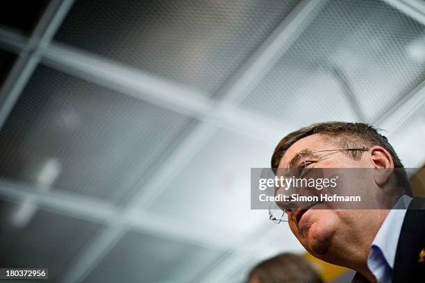 New IOC President Thomas Bach looks on during his arrival at Frankfurt Airport on September 12, 2013 in Frankfurt am Main, Germany.