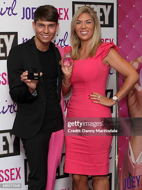 Joey Essex and sister Frankie Essex attend a photocall to launch his 2 new fragrances on September 12, 2013 in London, England.