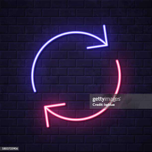 refresh. glowing neon icon on brick wall background - intersection night stock illustrations