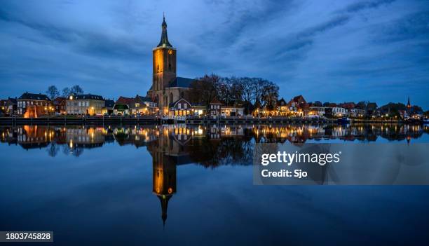 hasselt sunset view on the riverbank of the zwarte water - hasselt stock pictures, royalty-free photos & images