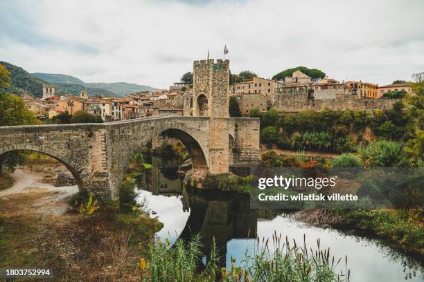 romanesque bridge in besalú - girona spain - besalu stock pictures, royalty-free photos & images