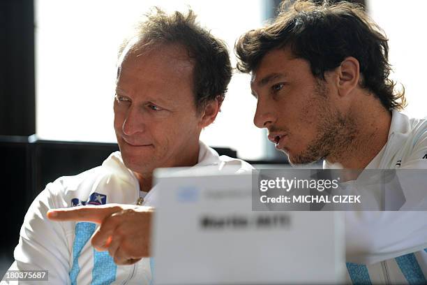 Argentina's Davis cup players Martin Jaite and Juan Monaco attend the drawing of Davis Cup semi-final Argentina vs Czech Republic on September 12,...