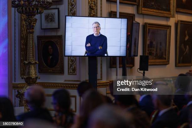 Pre-recorded message by co-founder of Microsoft and co-chair of the Bill & Melinda Gates Foundation Bill Gates is broadcast during the opening...