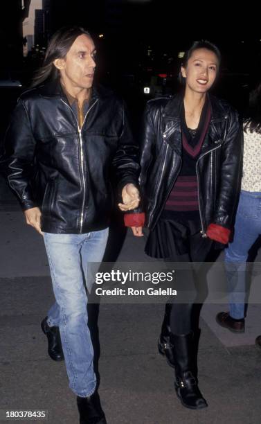 Iggy Pop and wife Suchi Asano attend the screening of "Serial Mom" on April 4, 1994 at Loew's Screening Room in New York City.