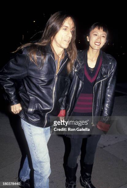 Iggy Pop and wife Suchi Asano attend the screening of "Serial Mom" on April 4, 1994 at Loew's Screening Room in New York City.