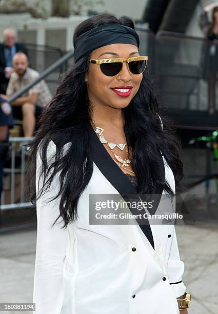 Singer Melanie Fiona attends 2014 Mercedes-Benz Fashion Week during day 7 on September 11, 2013 in New York City.