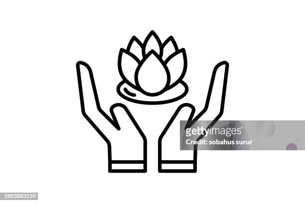 hand holding lotus icon icon related