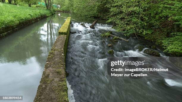 flowing river aufsess in front of a mill, doos, upper franconia, bavaria, germany - doos stock pictures, royalty-free photos & images