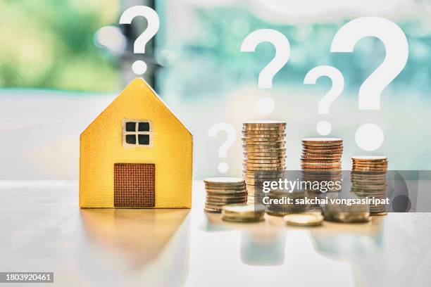 house model with question marks, home problems, house building problems, problems with buying a house and selling a house, financial problems in buying a house - rent assistance stock pictures, royalty-free photos & images