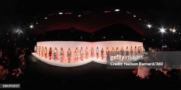 Models pose on the runway at the Clover Canyon fashion show during Mercedes-Benz Fashion Week Spring 2014 on September 11, 2013 in New York City.