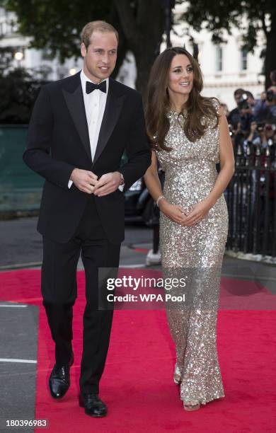 Prince William, Duke of Cambridge and Catherine, Duchess of Cambridge attend The Tusk Conservation Awards at The Royal Society on September 12, 2013...