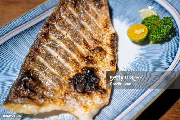 burikama shioyaki teriyaki , japanese grilled fish - january 2021 stock pictures, royalty-free photos & images
