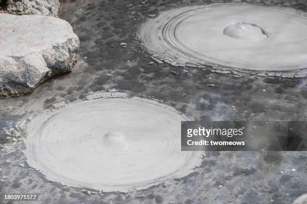volcanic pond with mud bubble. - bubble pond stock-fotos und bilder