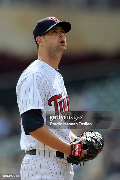 Scott Diamond of the Minnesota Twins reacts during the fourth inning of the game against the Oakland Athletics on September 12, 2013 at Target Field...