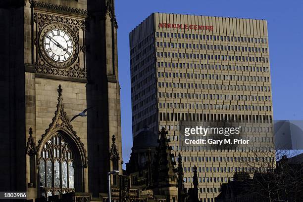 Manchester Cathedral with the Arndale Centre, the site of an IRA bomb blast in 1996 in Manchester, England on February 9, 2003.