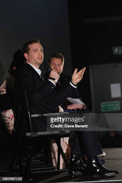Producer Joe Gebbia speaks during a Q&A as moderator James Corden looks on at the Premiere screening of "We Dare to Dream" at Cineworld Leicester...