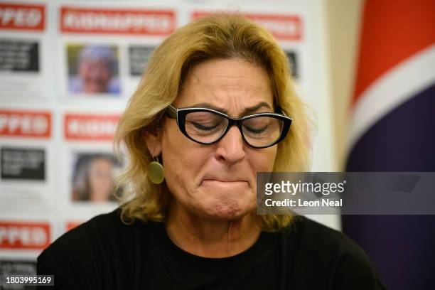 Orit Meir, the mother of Almog Meir, addresses journalists during a press conference at the Embassy of Israel by family members of some of those held...