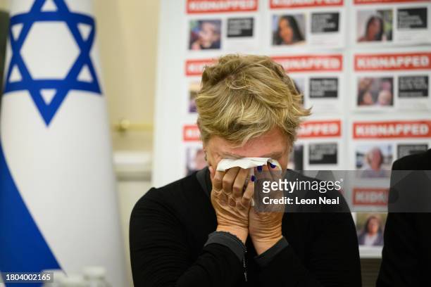 Iris Haim, the mother of Yotam Haim, addresses journalists during a press conference at the Embassy of Israel by family members of some of those held...