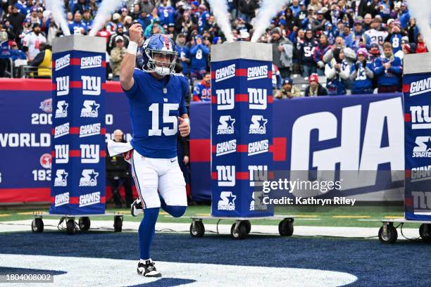 Tommy DeVito of the New York Giants runs onto the field prior to the start of the game against the New England Patriots at MetLife Stadium on...