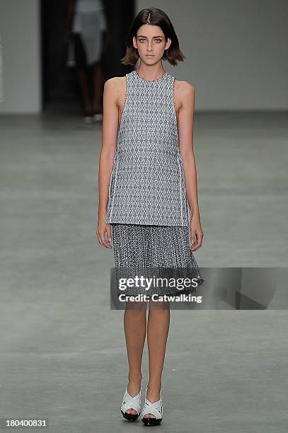 Model walks the runway at the Calvin Klein Spring Summer 2014 fashion show during New York Fashion Week on September 12, 2013 in New York, United...