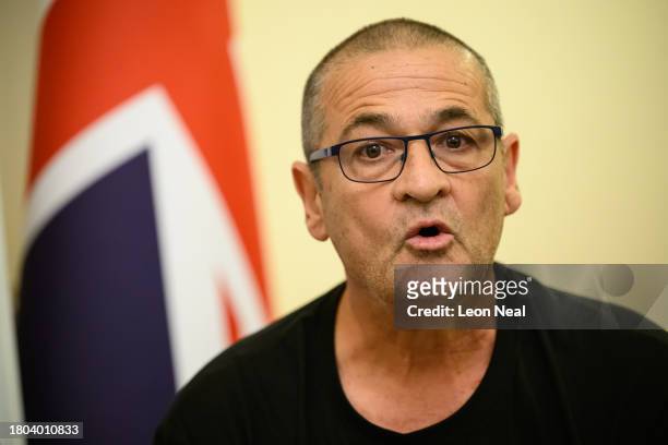 Aviram Meir, the uncle of Almog Meir, addresses journalists during a press conference at the Embassy of Israel by family members of some of those...