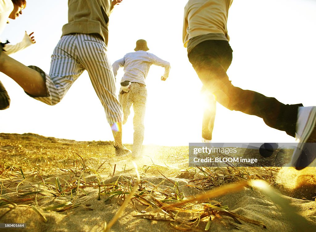 Group Of Friends Running