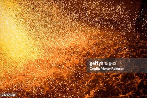 impact of molten metal poured on water in steel foundry - molten stock pictures, royalty-free photos & images