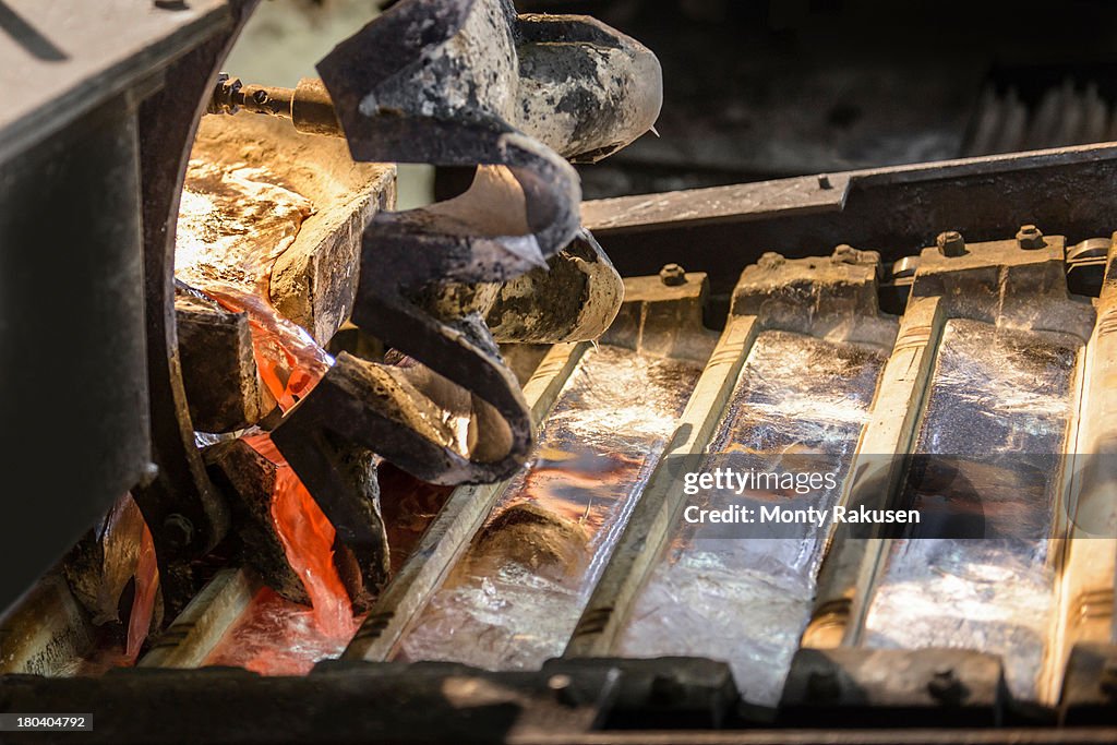 Close up of ingot casting machine in aluminium foundry