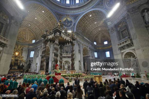 Faithful participate in the Holy Mass celebrated by the Pope on the occasion of the VII World Day of the Poor in St. Peter's Basilica. Vatican City ,...