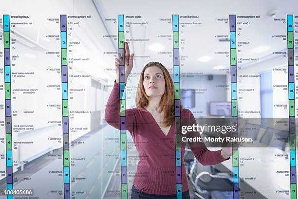 businesswoman in office using interactive screen - gesture control screen imagens e fotografias de stock