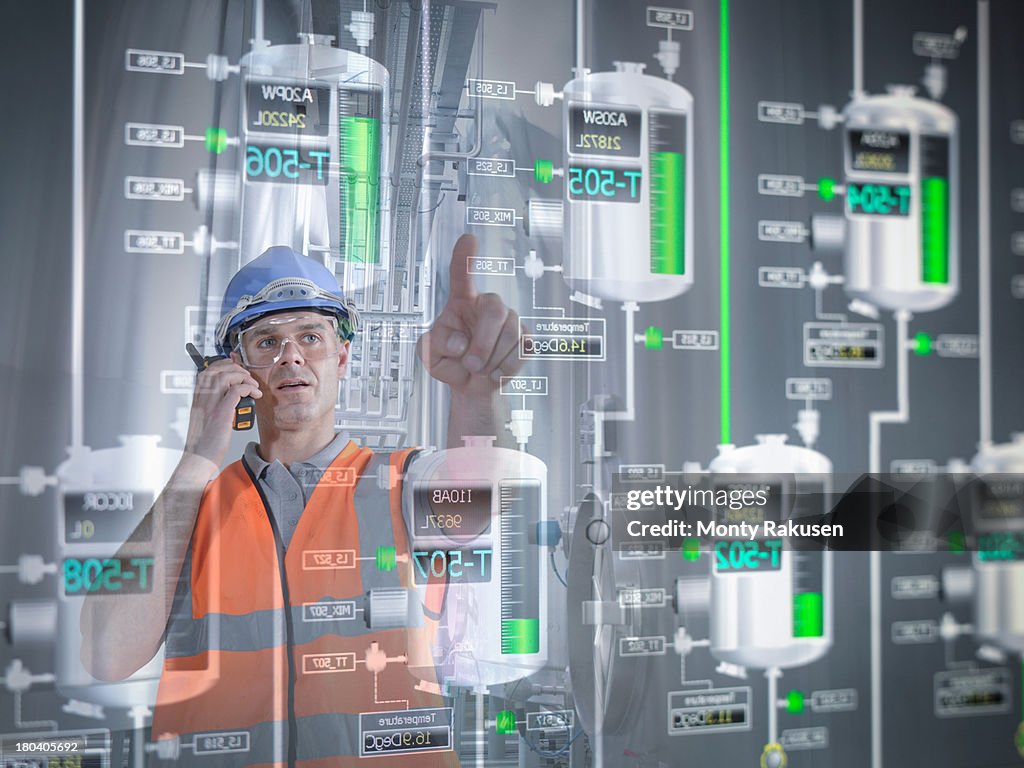 Supervisor Monitor Factory Supervisor Monitoring Product Levels On Interactive Display ...