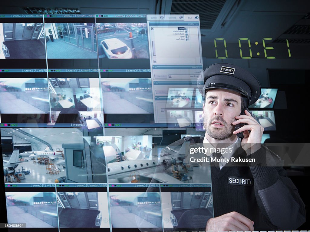 Security Guard Monitoring Camera Visuals On Interactive Screen High-Res ...