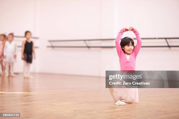 young ballerina posing in studio - indian ballet dancer stock pictures, royalty-free photos & images