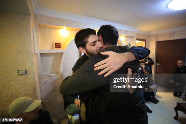 Emin Muhammed el-Abbasi reunites with his family as he is released from Israeli jail as part of the hostage swap deal between Israel and Palestinian...