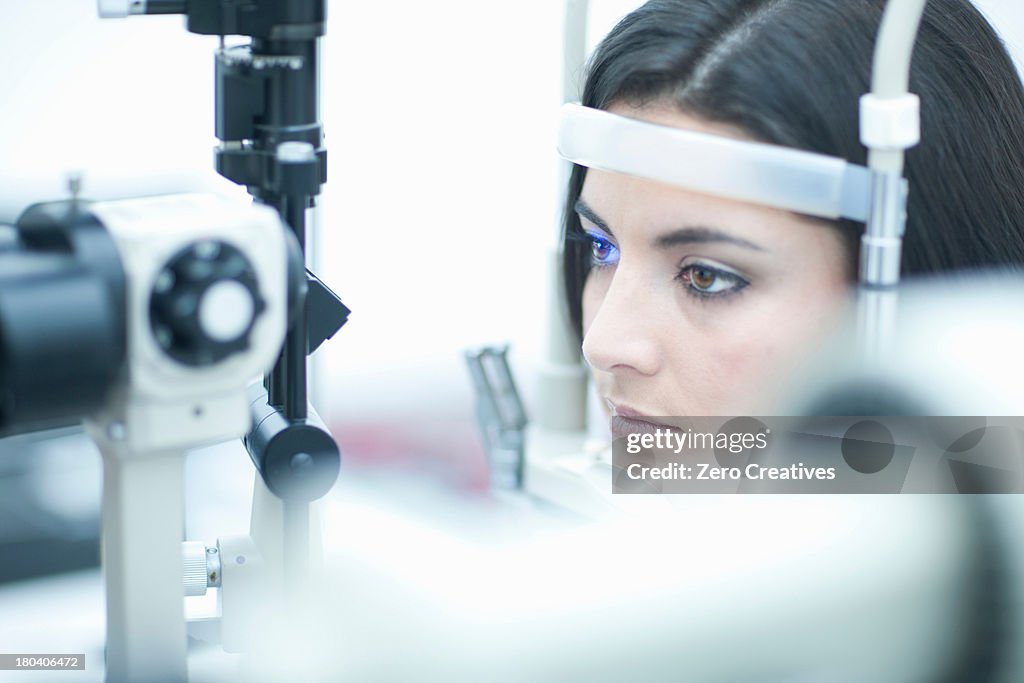 Woman having eye examination