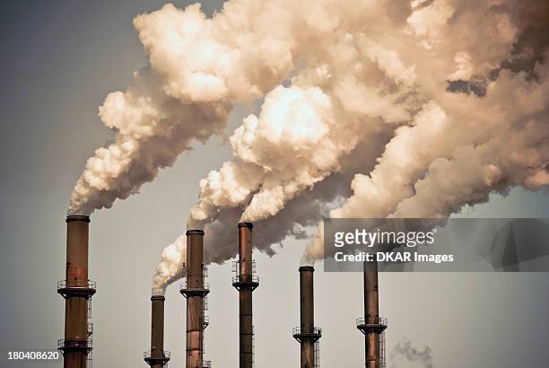 usa, florida, industrial smokestacks - luftverschmutzung stock-fotos und bilder